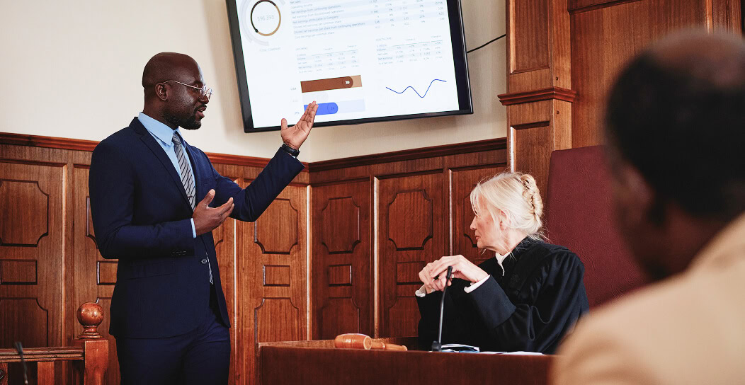 Business presentation, courtroom, professional speaker, legal discussion, conference.